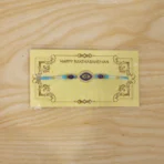 Evil Eye Designer Rakhi with Blue Beads (1 Pc) - Image 2