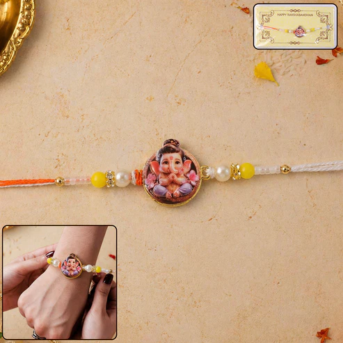 RAKKHI07-01_e7184247-9b81-46f7-939b-536ae05a2658 Ganesh Ji Designer Rakhi with Yellow Beads (1 Pc) - Image 1