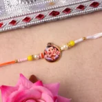 Ganesh Ji Designer Rakhi with Yellow Beads (1 Pc) - Image 2