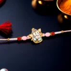 Cute Ganesha Designer Rakhi with Pink and Red Beads (1 Pc)