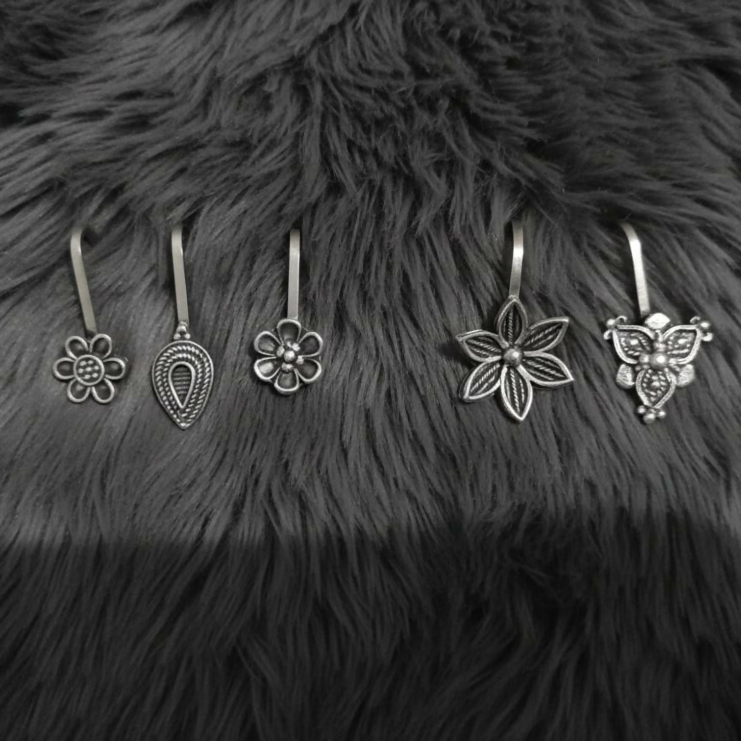 05PhI6K1WO.jpg Oxidized Silver Traditional Floral Nose Pins Combo for Women & Girls (Pack of 5) - Image 1