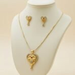 Gold-plated Heart Pendant and Earrings Set with Ruby and Cubic Zirconia - Image 2