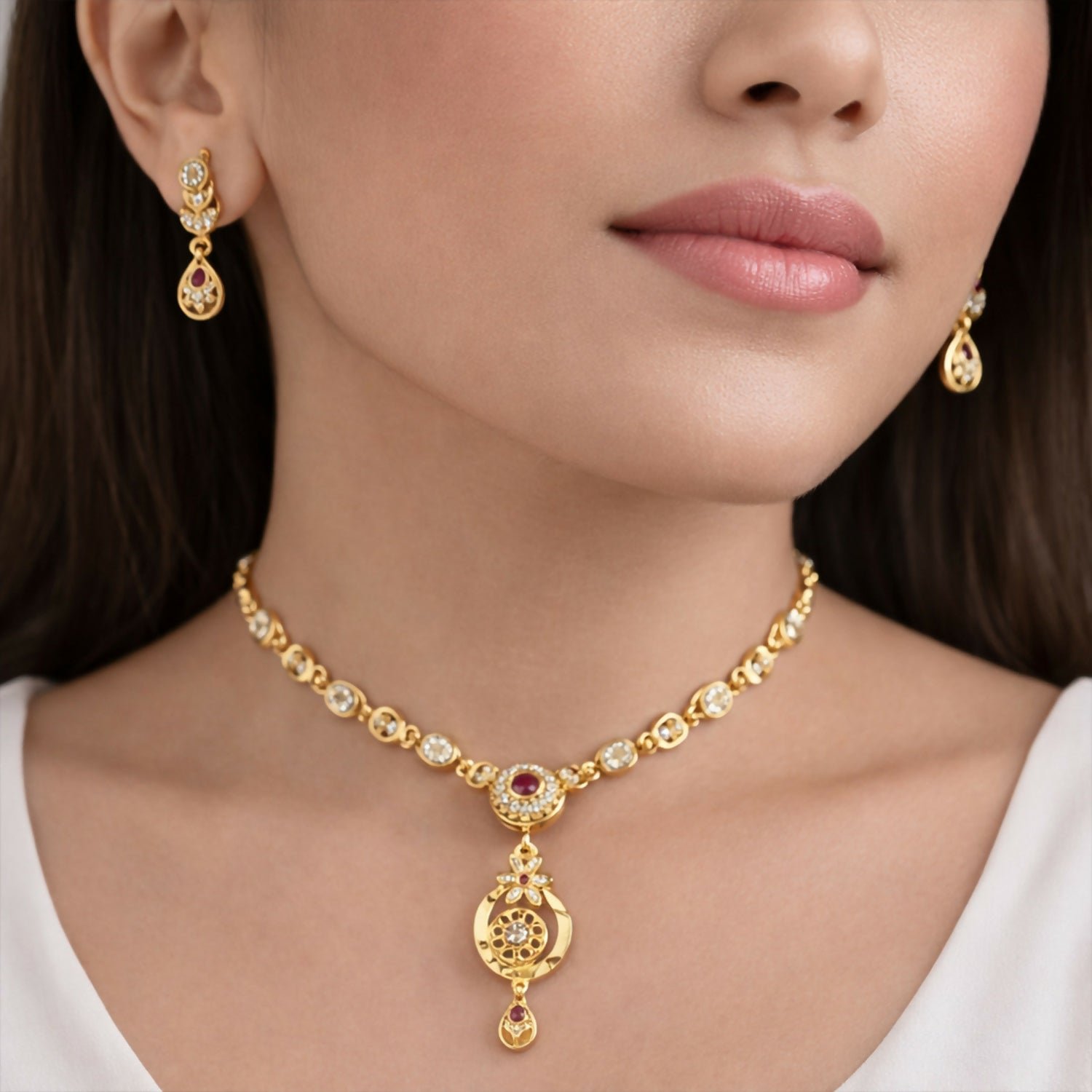 6AwpamlXCm.jpg Stylish Gold-Tone Circular Pendant Necklace Set with Floral Accent & Matching Earrings - Image 1