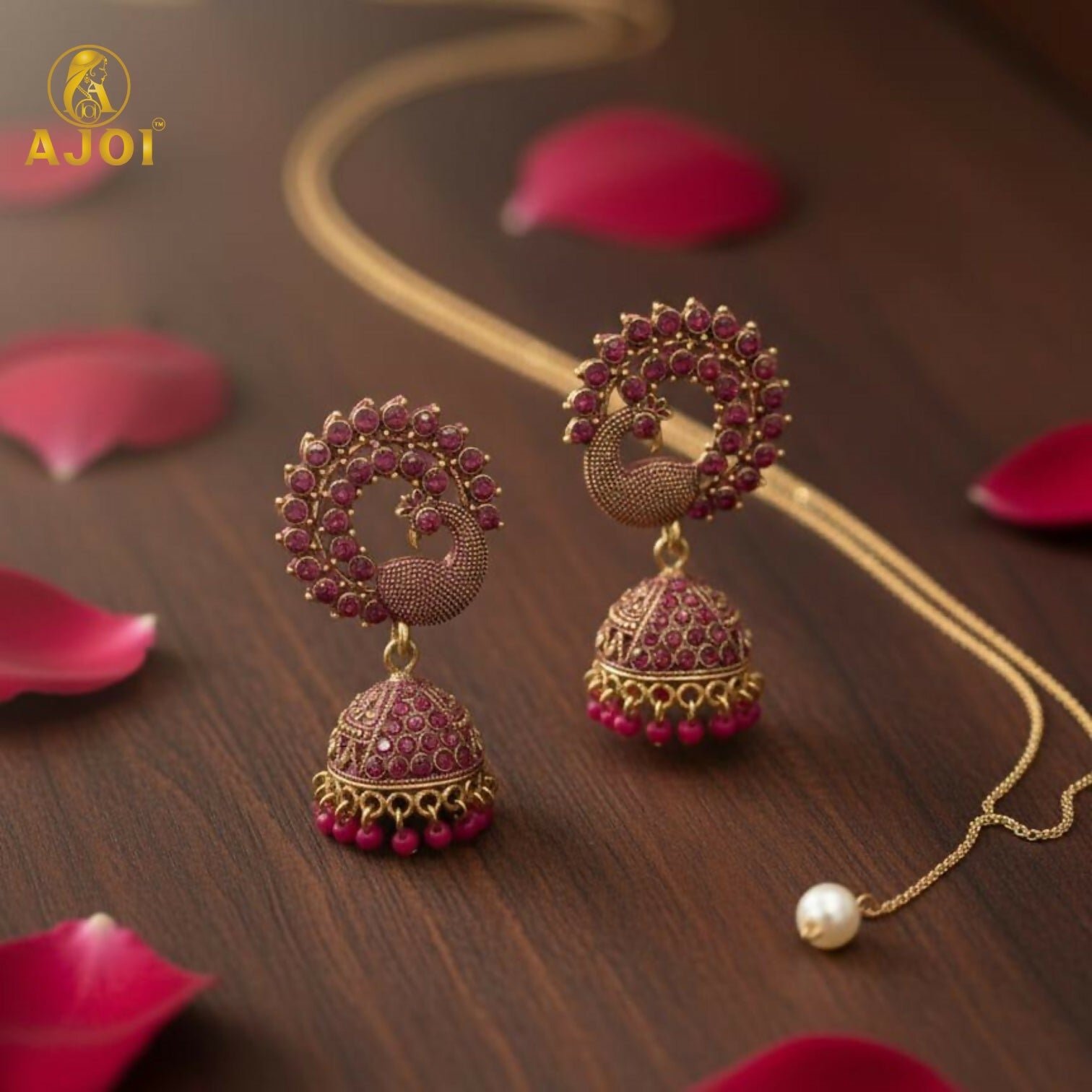 FnnQe0q0Ca.jpg Peacock Motif Ruby-Tone Jhumka Earrings in Antique Gold Finish - Image 1