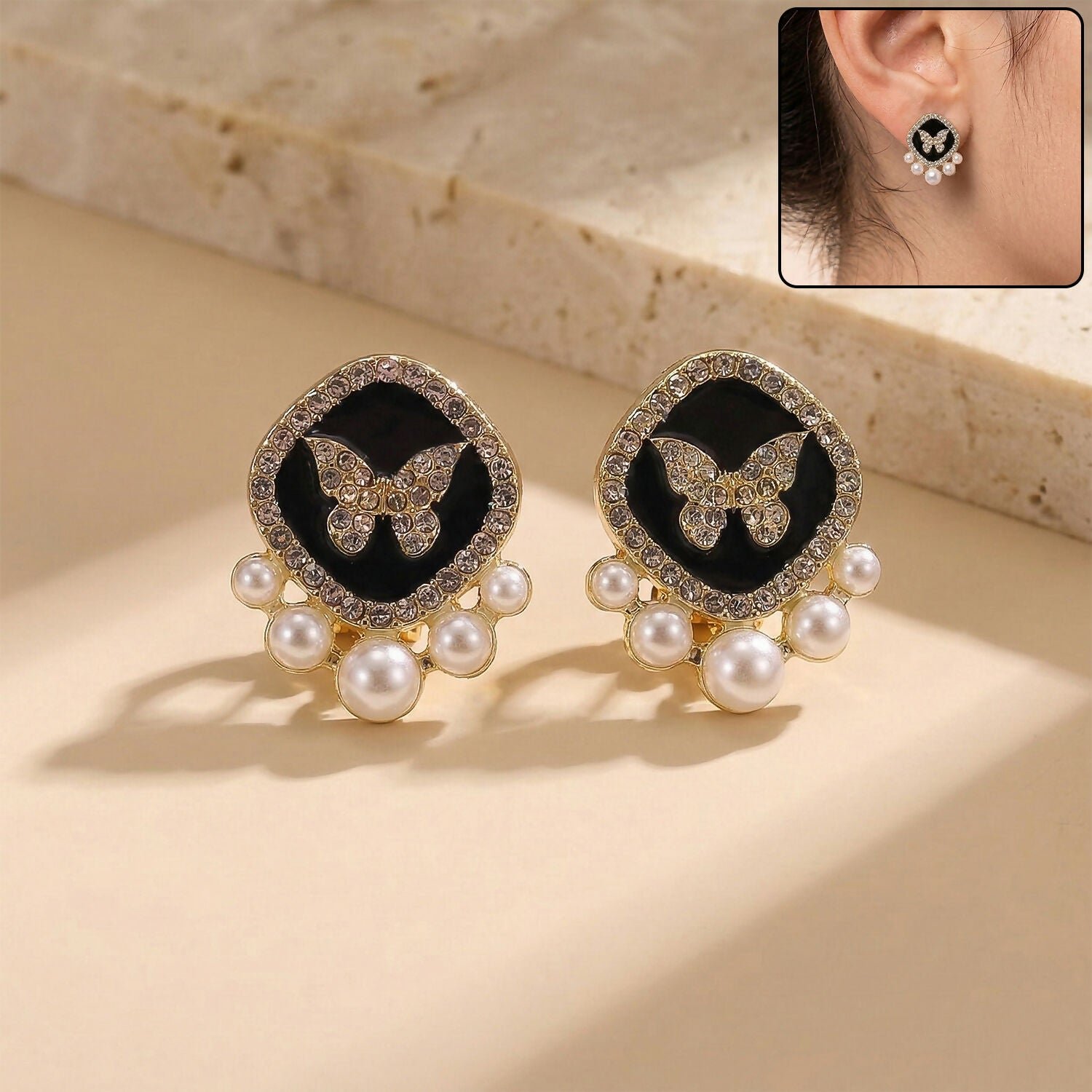 lTTPR1N5rw.jpg Luxury Butterfly Pearl Stud Earrings with Black Enamel & Crystals - Image 1