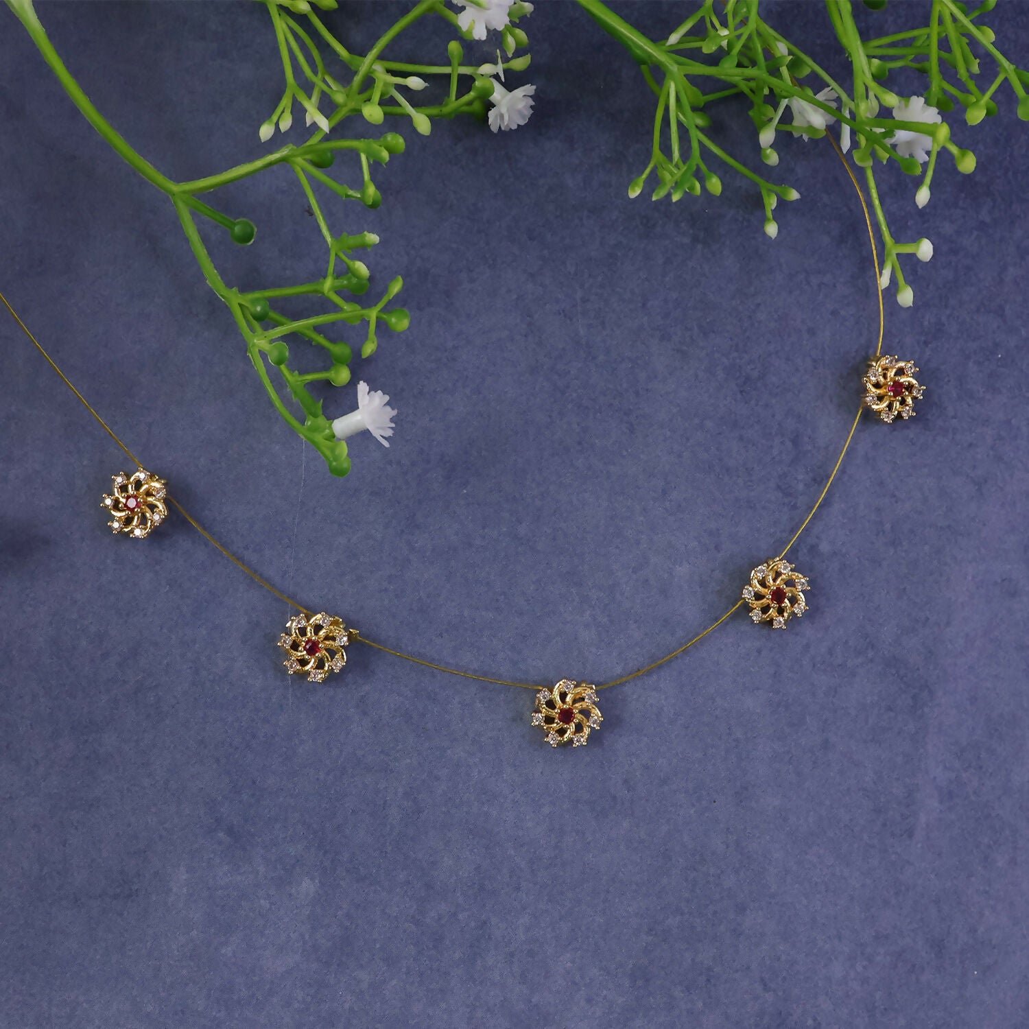 zpf34O9h4Y.jpg Ruby Floral Station Necklace with Diamond Detailing and Elegant Gold Chain Design - Image 1